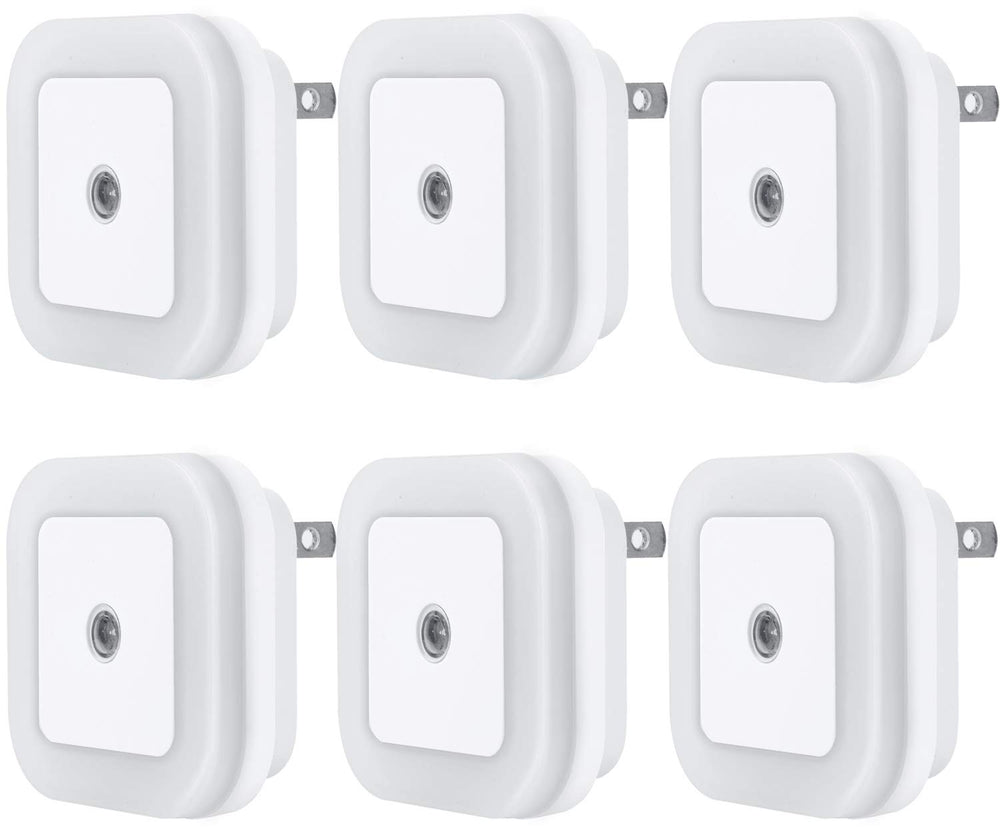 Uigos night light with dusk-to-dawn sensor providing safe living room illumination.