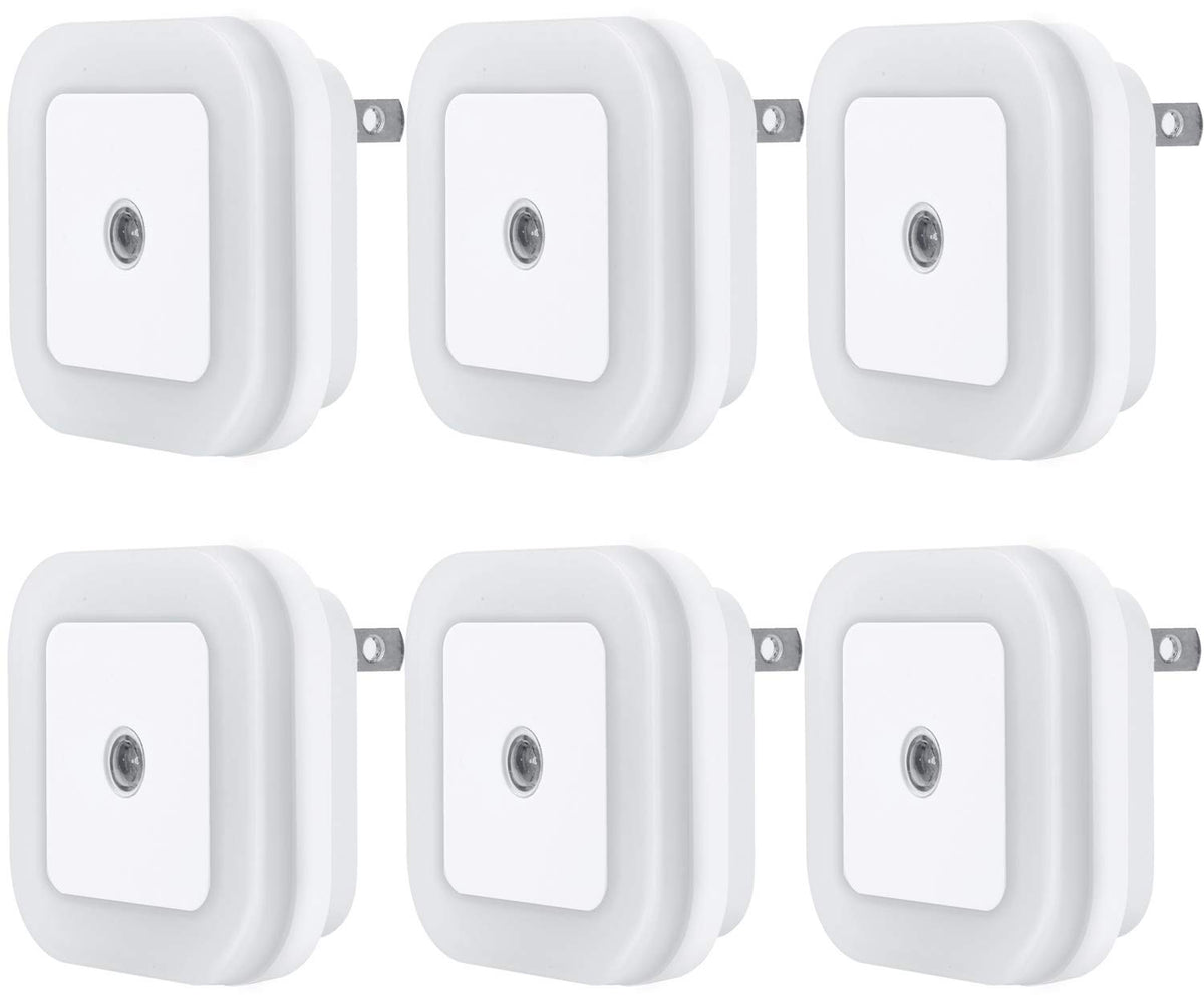 Uigos night light with dusk-to-dawn sensor providing safe living room illumination.
