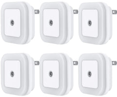 Uigos night light with dusk-to-dawn sensor providing safe living room illumination.