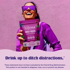 Ultima Replenisher Daily Focus glass of water with stickpack demonstrates easy, balanced hydration.
