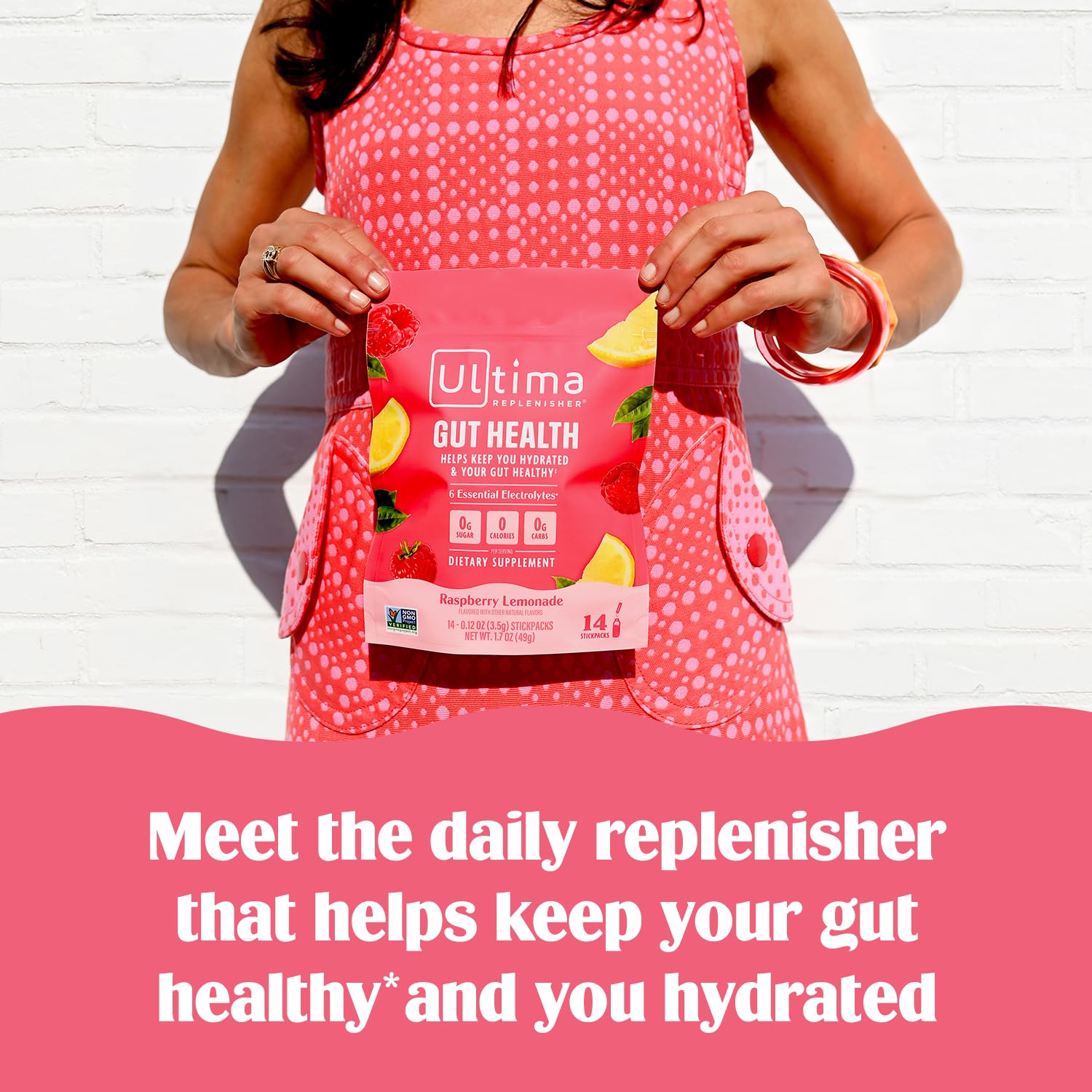 Ultima Replenisher in a glass of water with a dissolving stickpack for refreshing hydration.