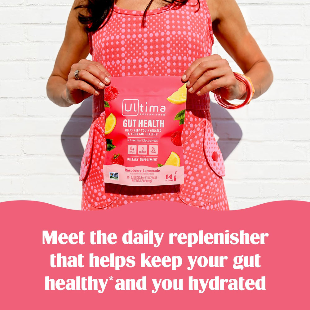 Ultima Replenisher in a glass of water with a dissolving stickpack for refreshing hydration.