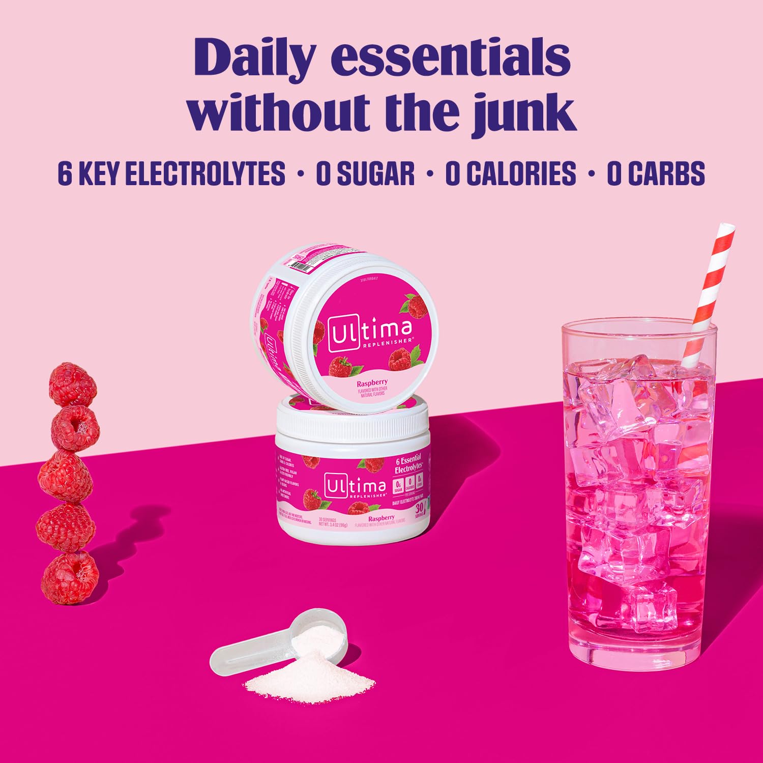 Ultima Replenisher Raspberry with scoop dissolving in a glass of water