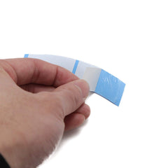 Ultra Hold Minis wig application tape on lace wig showcasing reliable hold.