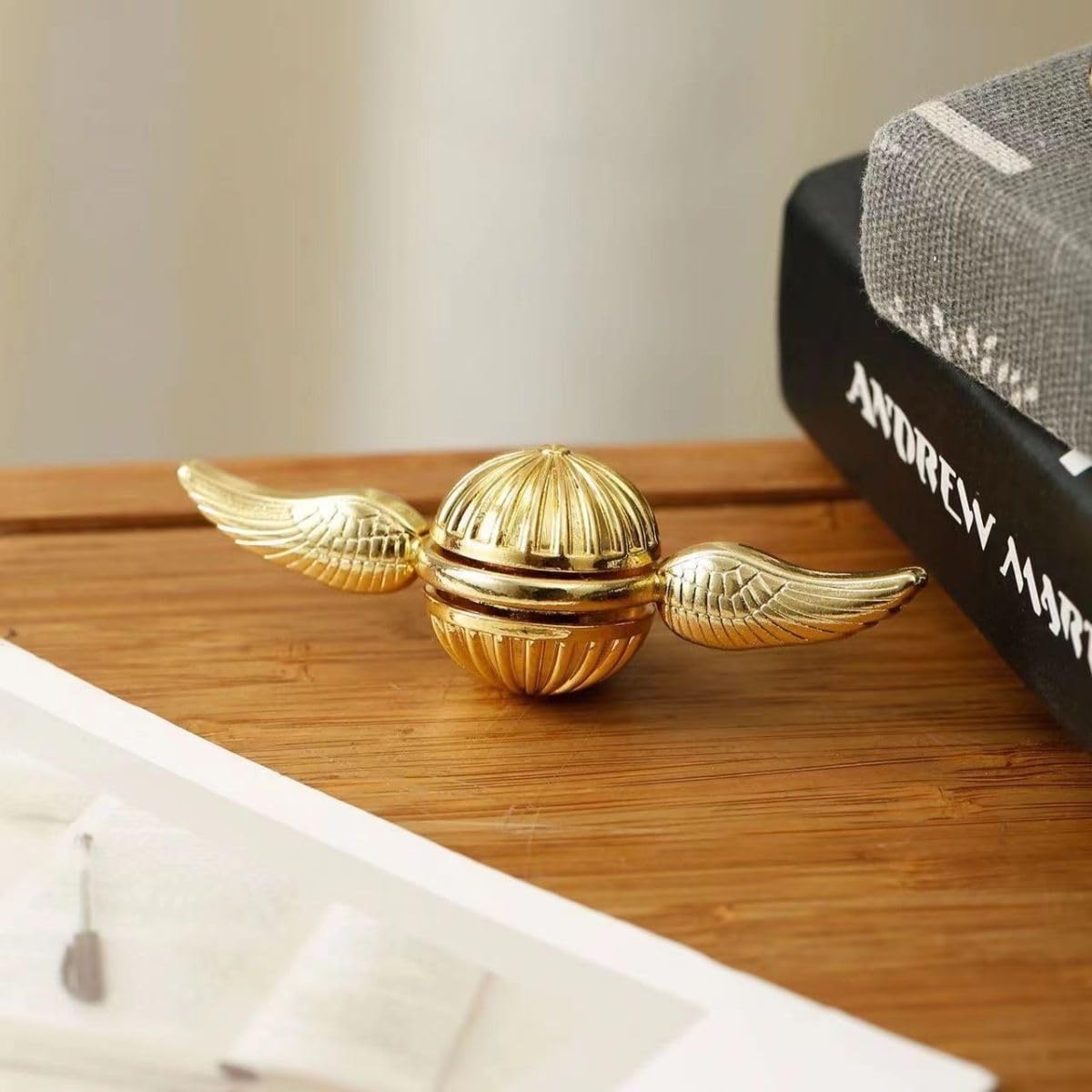 Umnodobn gold spinner on desk ideal gift