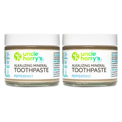 Uncle Harry's Peppermint Remineralizing Toothpaste in a glass jar for eco-friendly brushing.