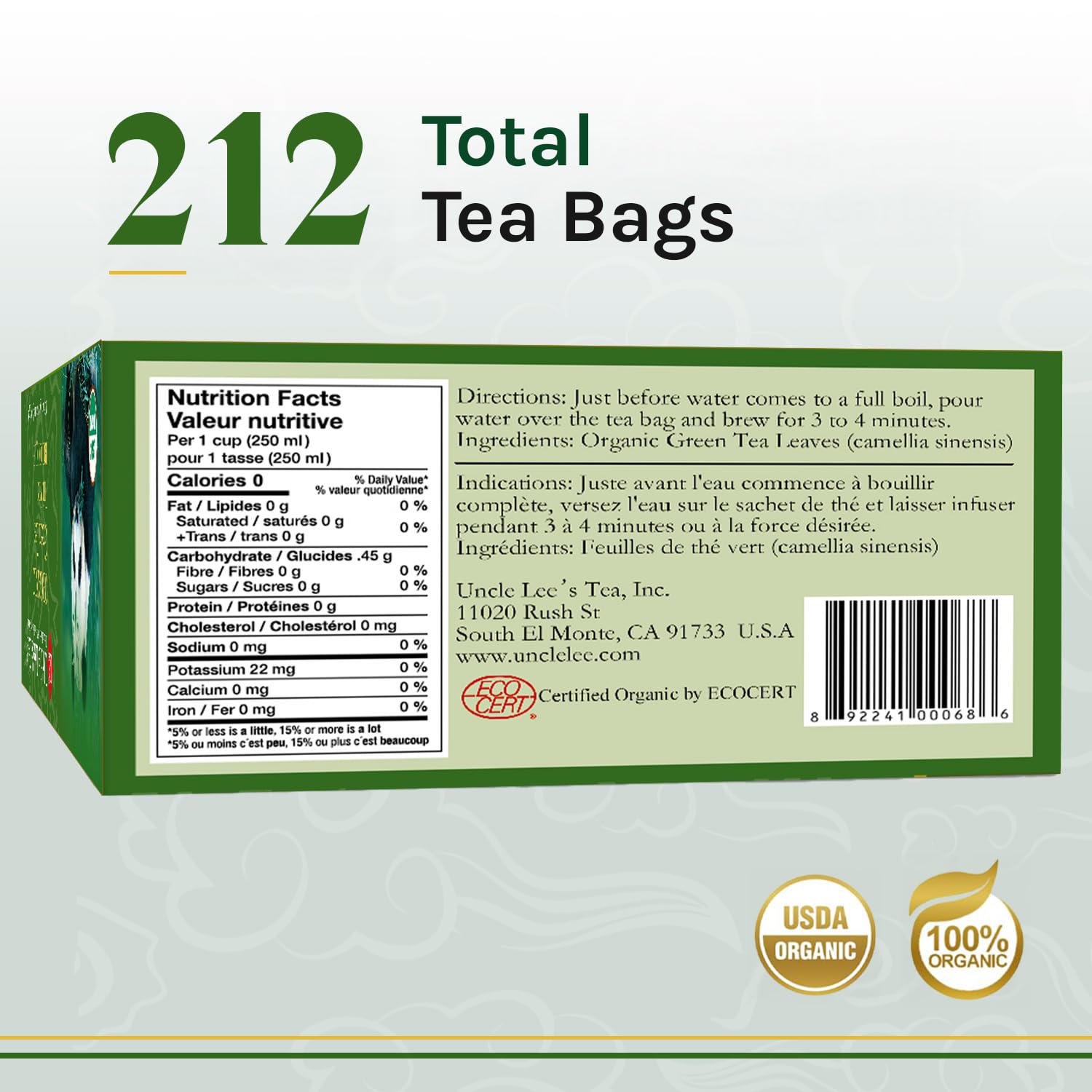 Uncle Lee's Organic Green Tea bags closeup reveals vibrant leaves.