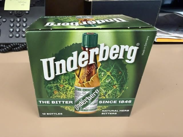 Underberg 20 ml bottle close-up highlighting compact single-serve design