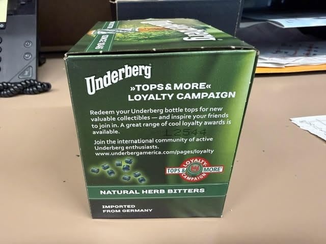 Underberg bottle label close-up showcasing heritage and natural ingredients