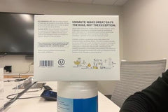 Unicity Unimate lemon-ginger stick dissolving in water for a refreshing citrus-mate drink.