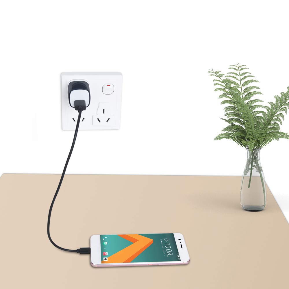 UorMe charger beside a phone to illustrate everyday charging convenience.