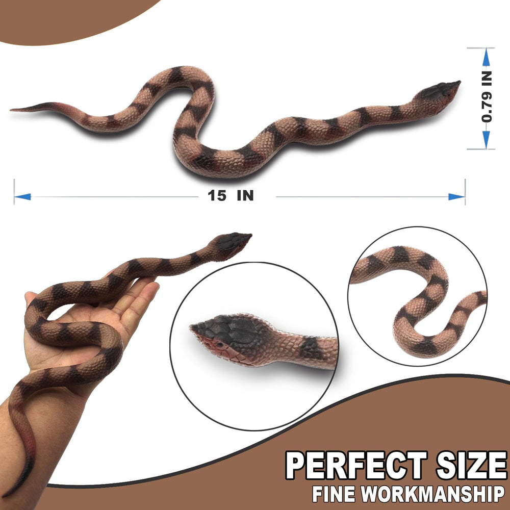 Upitry rubber snakes in garden deterring pests around beds