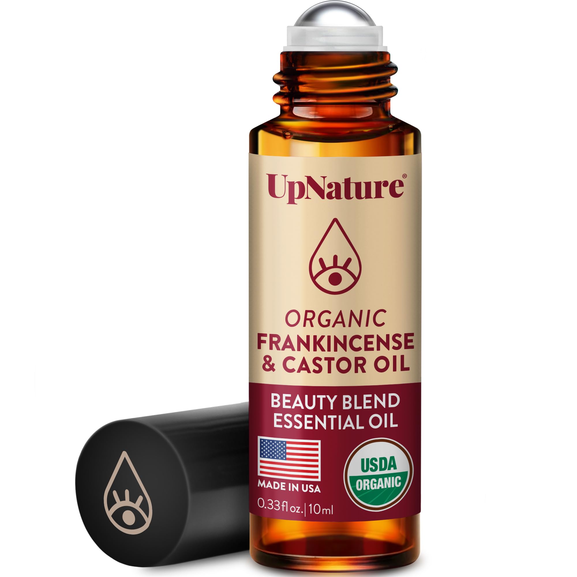 UpNature Beauty castor oil roll-on eye roller bottle for easy on-the-go skincare.