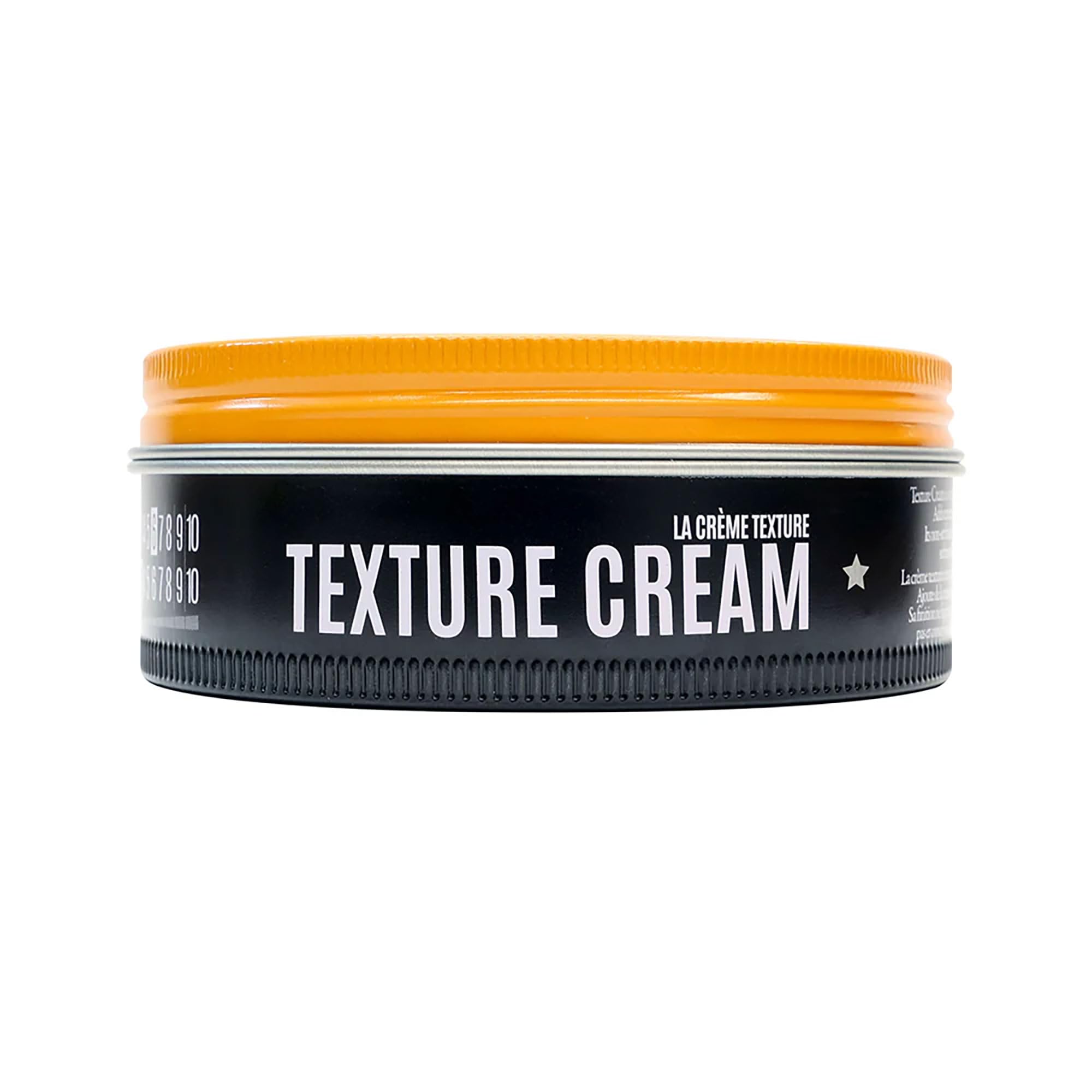 Hands styling hair with Texture Cream to demonstrate buildable hold.