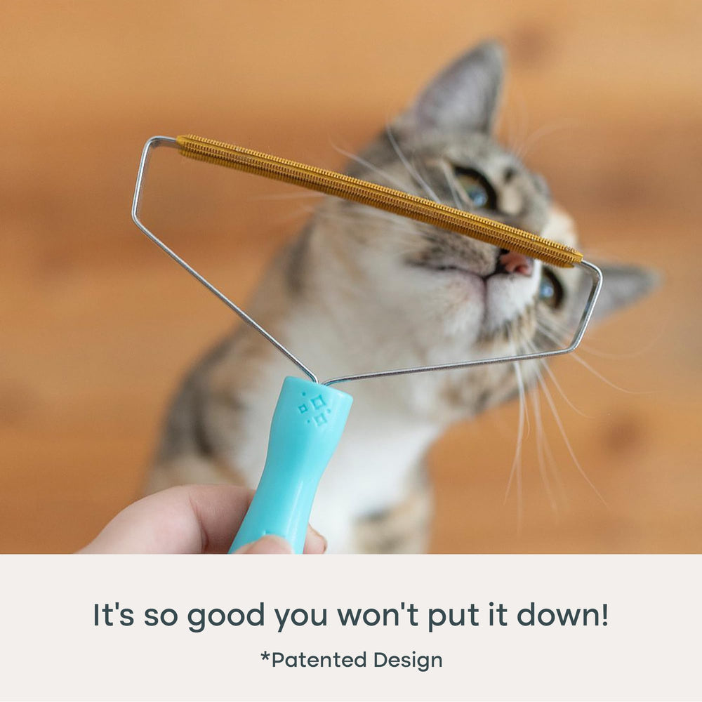 Uproot Cleaner Pro at cat tower removes fur from vertical surfaces.