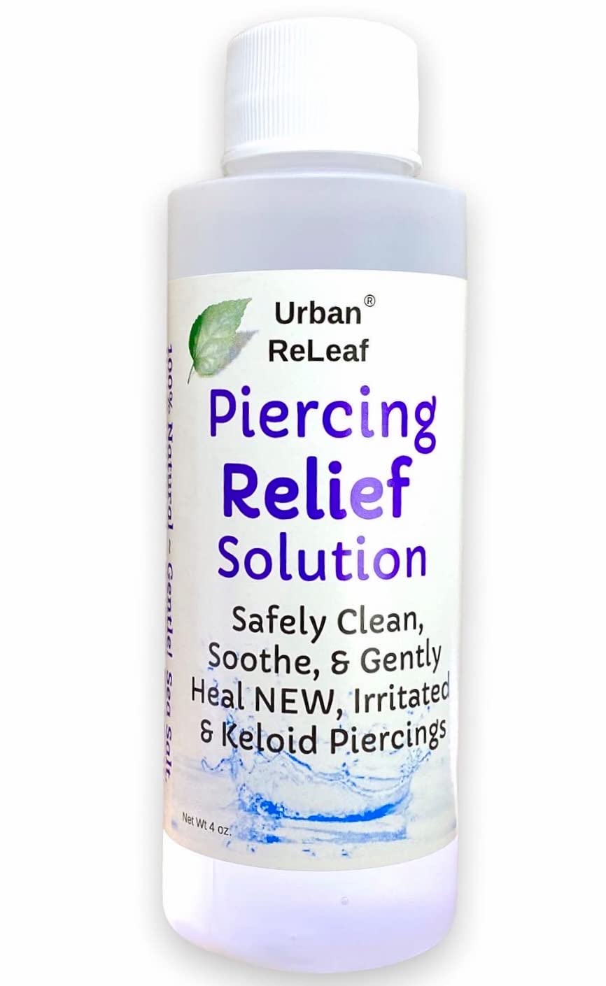 Urban ReLeaf Piercing Relief Solution bottle highlights natural sea salt blend for aftercare.