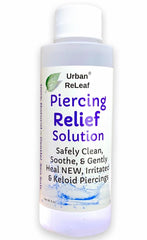 Urban ReLeaf Piercing Relief Solution bottle highlights natural sea salt blend for aftercare.