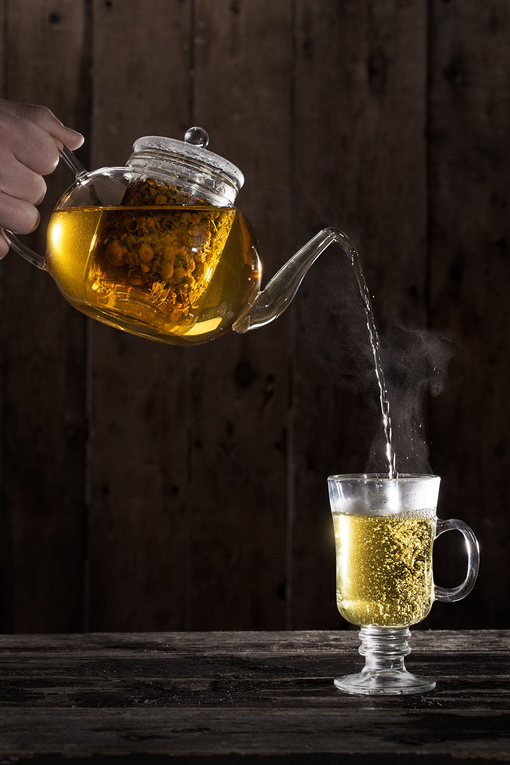 US Wellness Naturals chamomile tea steeping in a warm cup.
