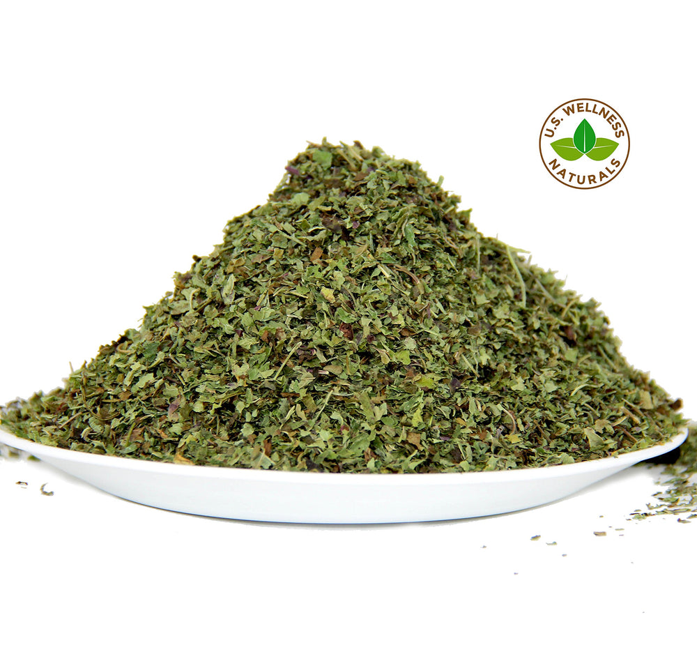 Close-up of dried lemon balm leaves from US Wellness Naturals for calm moments.