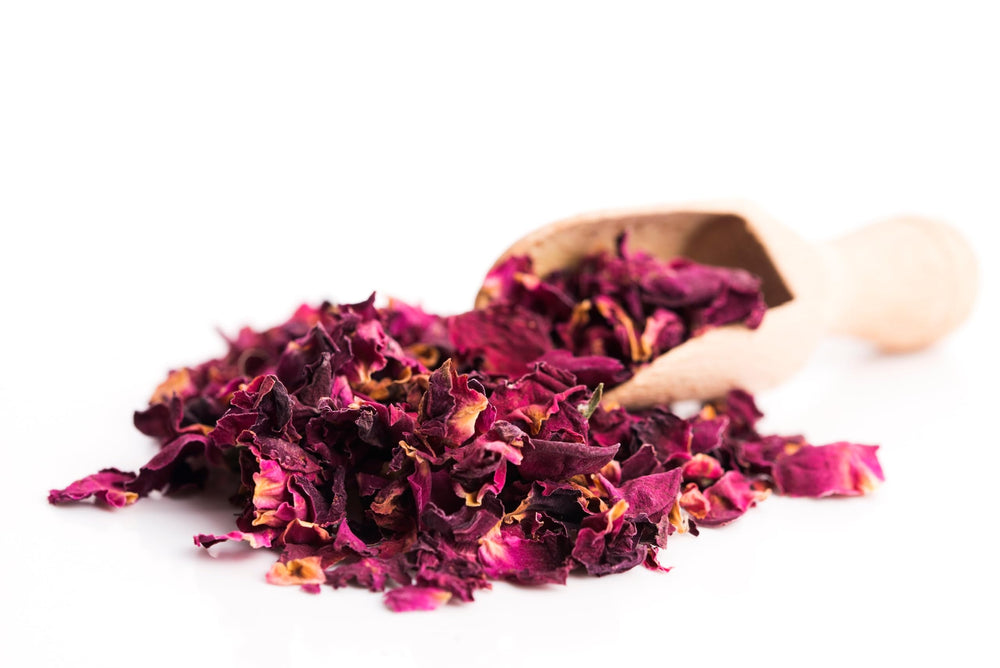 Brewing rose tea with US Wellness Naturals petals for a floral, soothing cup