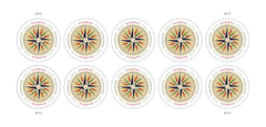 USPS Colorful compass-rose illustration on stamp evokes navigation and travel memories.