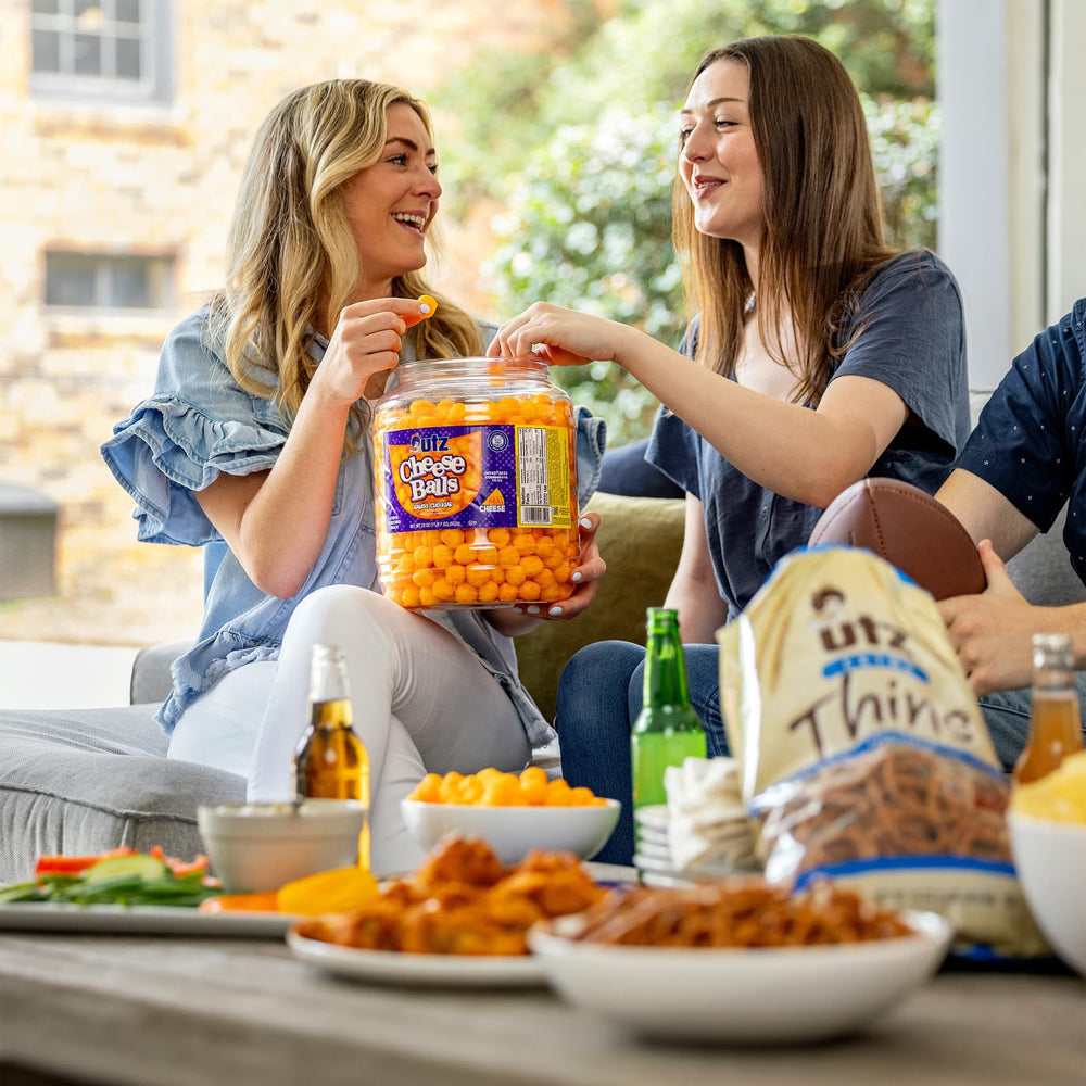 Utz Cheese Balls Barrel real cheddar cheese flavor shines in every bite.