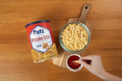 Re-sealable cap on Utz Potato Stix Original maintains freshness.
