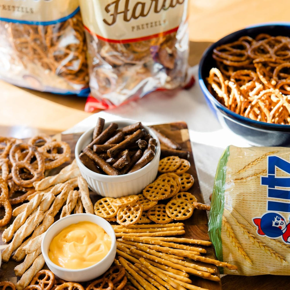 Utz pretzels on pantry shelf kept fresh in a resealable barrel.