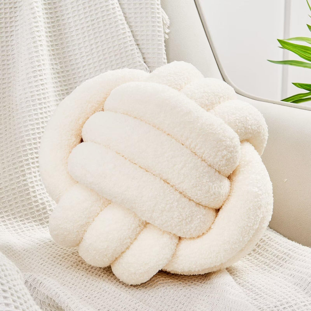 Uvvyui Knot Ball Pillow Ivory round 8.6 inches adds cozy decor and support.