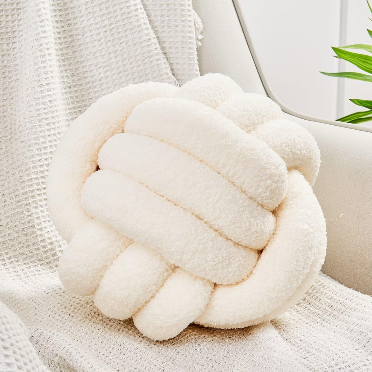 Uvvyui Knot Ball Pillow Ivory round 8.6 inches adds cozy decor and support.