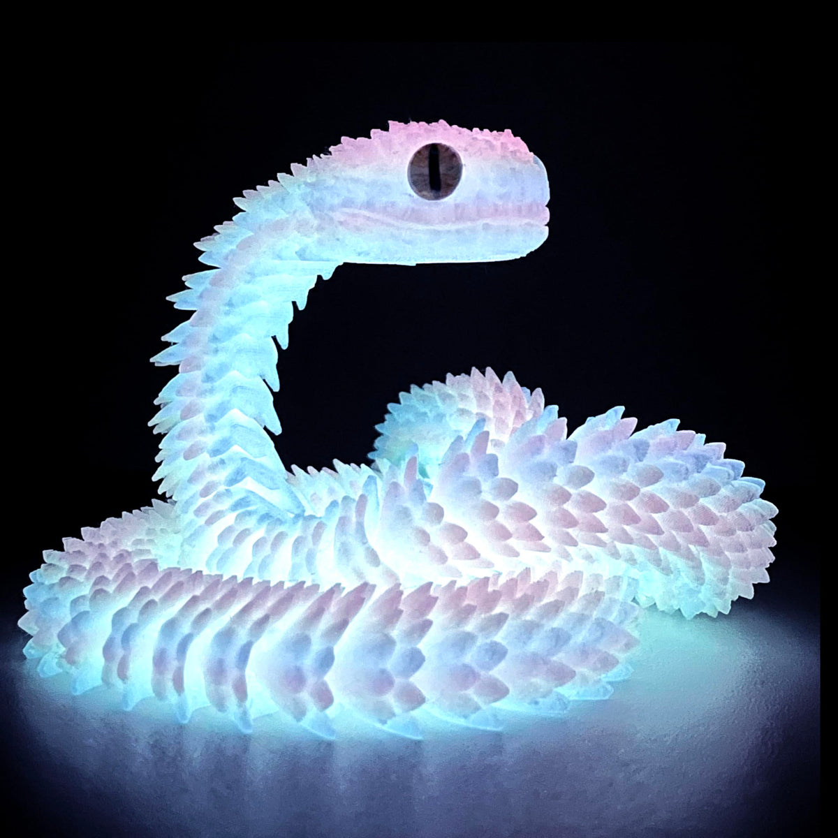 UXBSTM 24in snake toy in hinged pose for flexible desk play and focus.