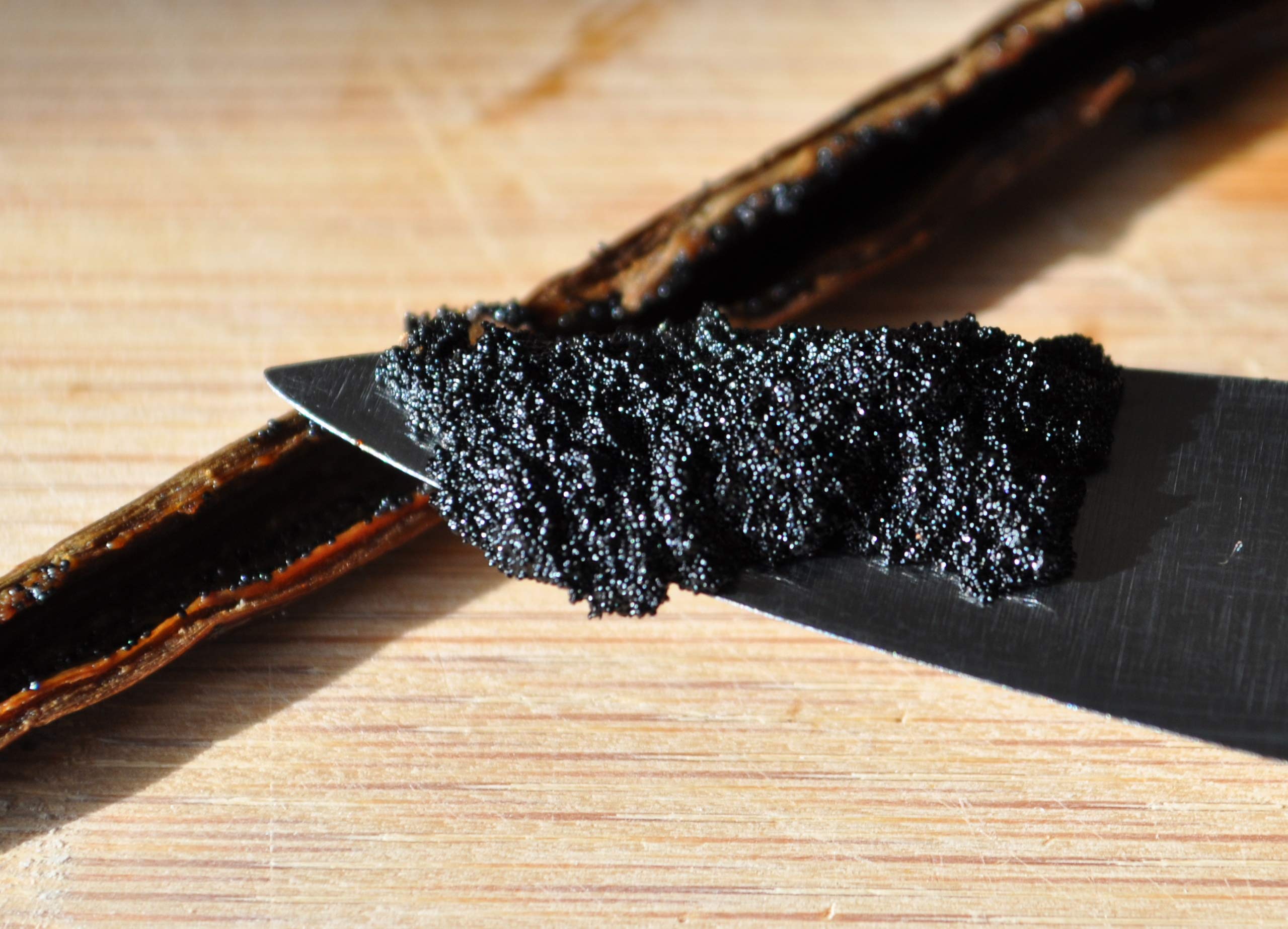 Fresh vanilla aroma from Vanilla Bean Kings pods in dessert prep.