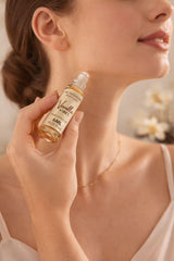 Close-up of Vanilla Vibes roll-on showing smooth application