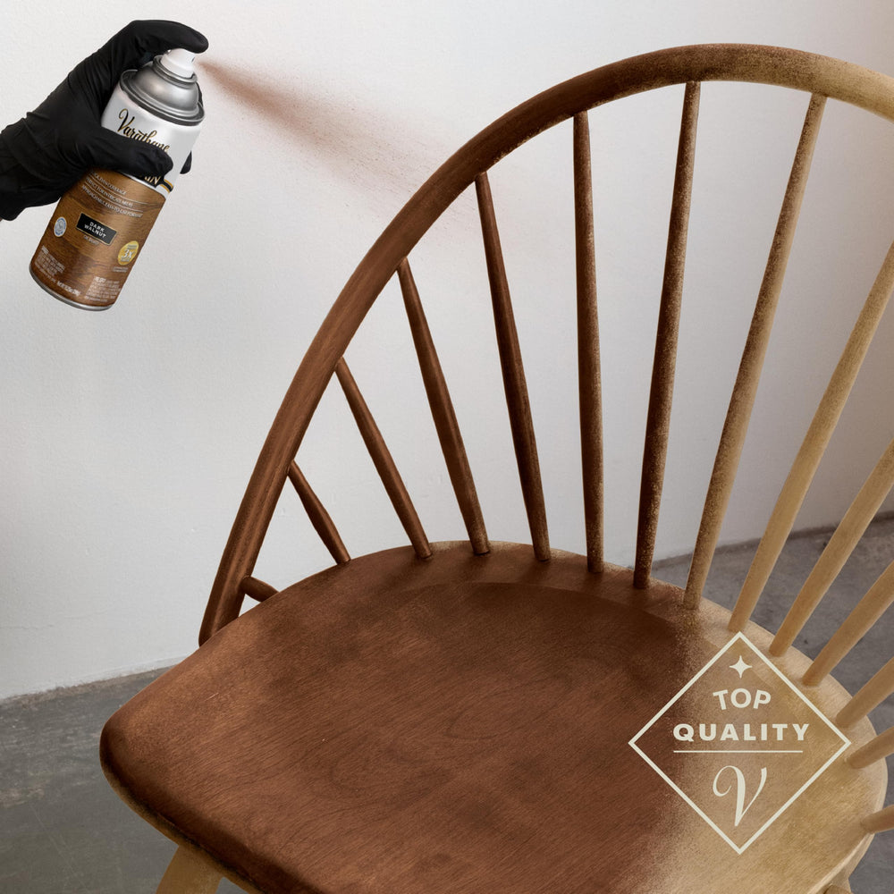 Varathane stain spray for paneling and spindles adds depth and color.