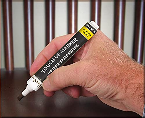 Varathane touch-up marker applied to furniture for fast, even color restoration on wood surface.