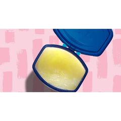 Vaseline Blueseal Applying on Baby Cheeks shows a light layer for delicate skin protection.