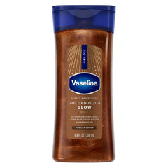 Vaseline Glazed & Glisten bottle with golden hour shimmer for radiant skin.