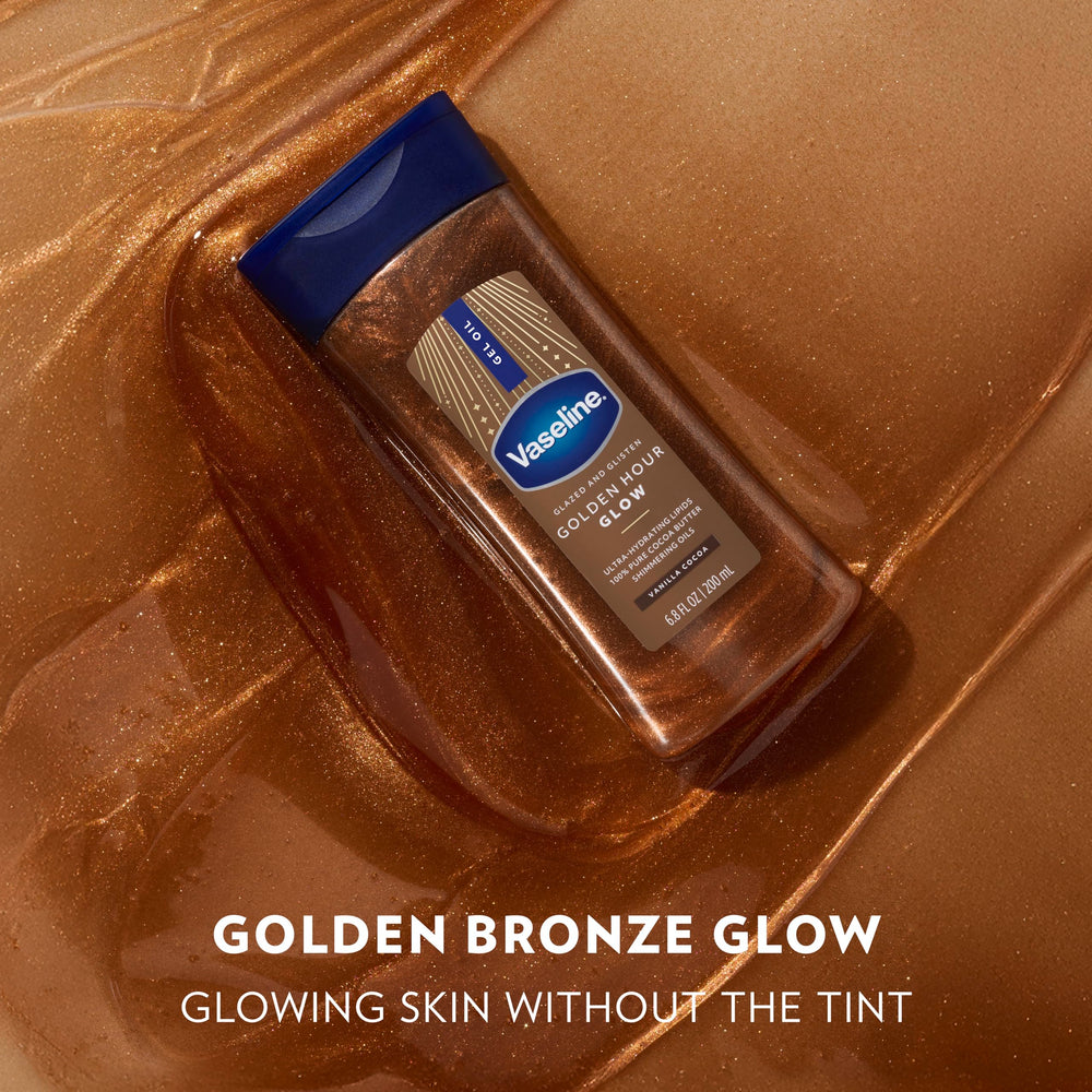 Shoulder and collarbone glow with Vaseline Golden Hour shimmer for a dewy finish.