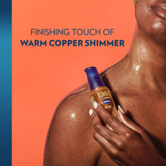 Glow on skin from Vaseline Illuminate Me Shimmering Body Oil in daylight