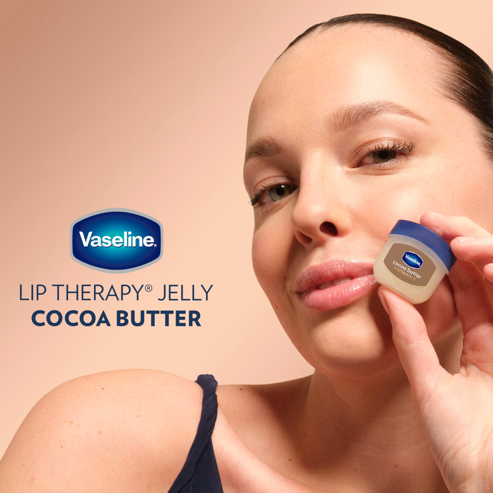 Vaseline Lip Therapy Cocoa Butter Mini two-pack displayed on vanity.