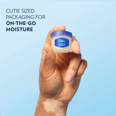 Close-up of Vaseline Lip Therapy Original Mini tube for smooth lip care.