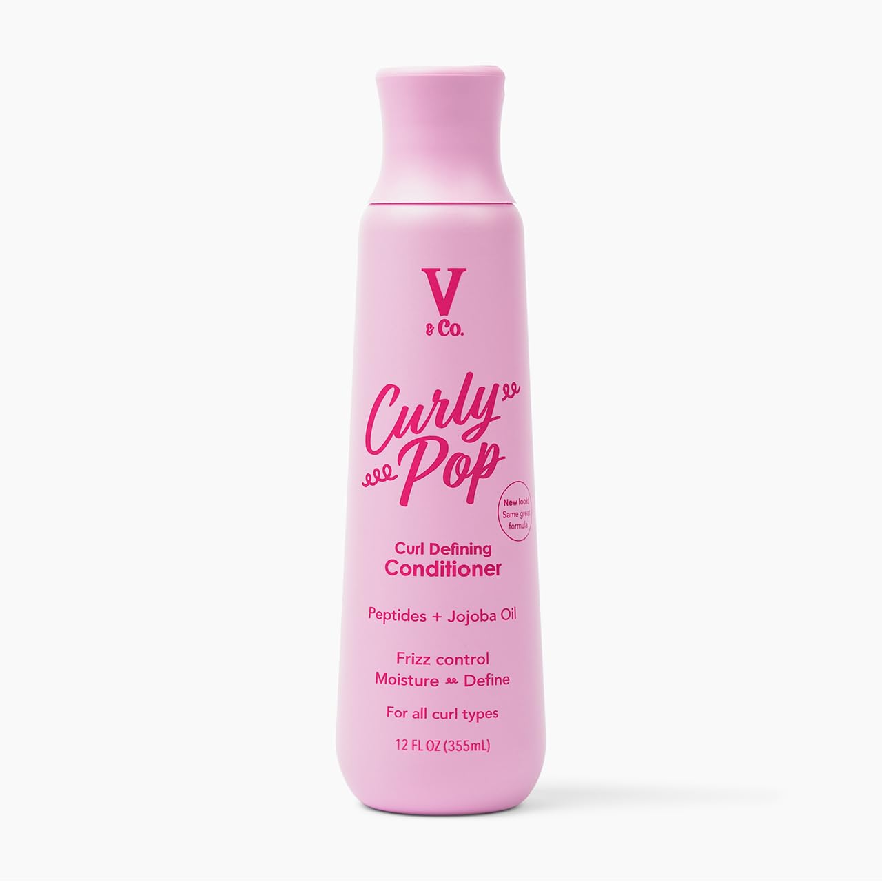 V&amp;CO Curly Pop bottle closeup, hydrating formula for defined curls.