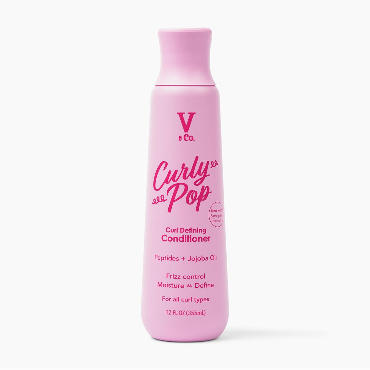 V&amp;CO Curly Pop bottle closeup, hydrating formula for defined curls.