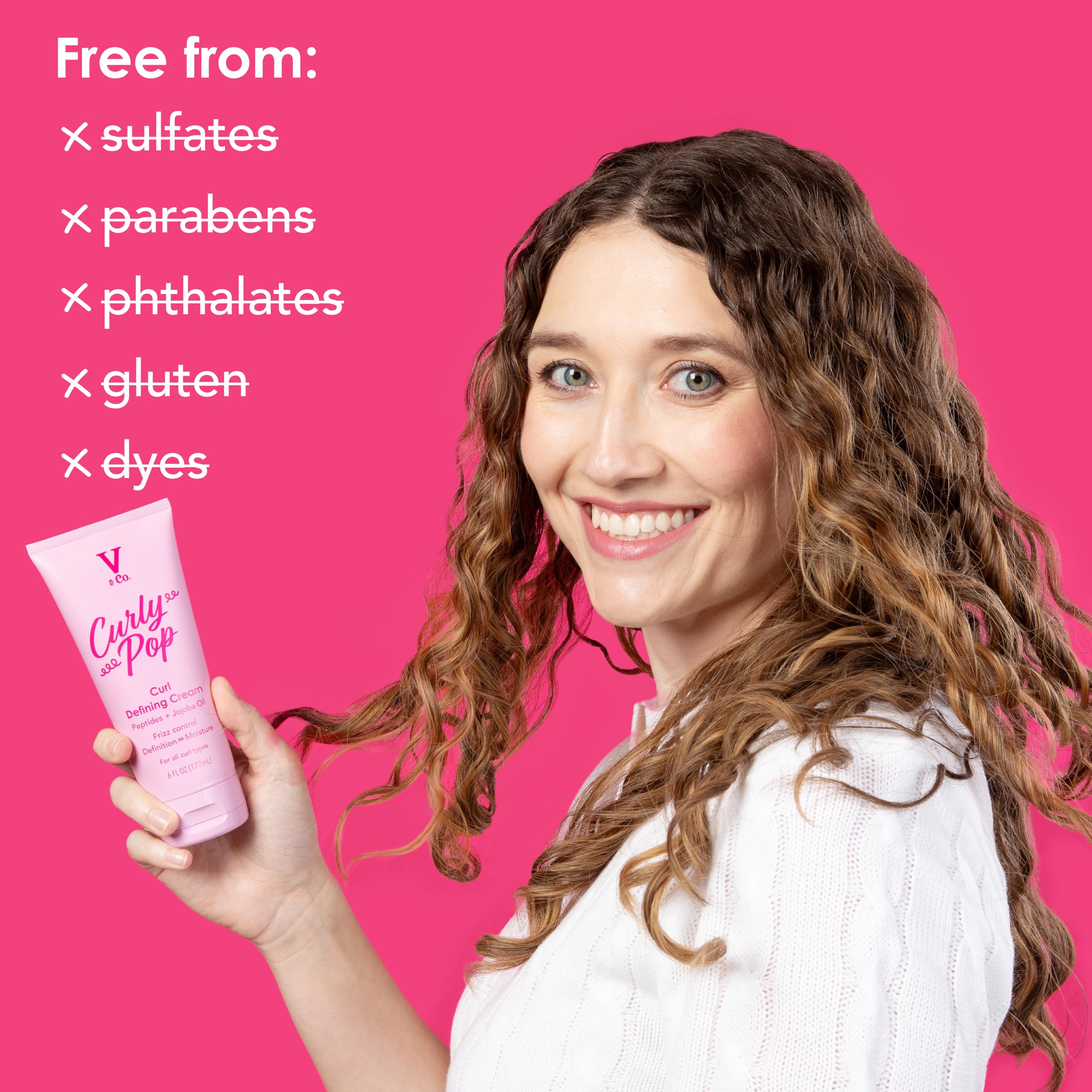 V&CO Curly Pop jojoba oil drop emphasizes rich hydration and scalp care.