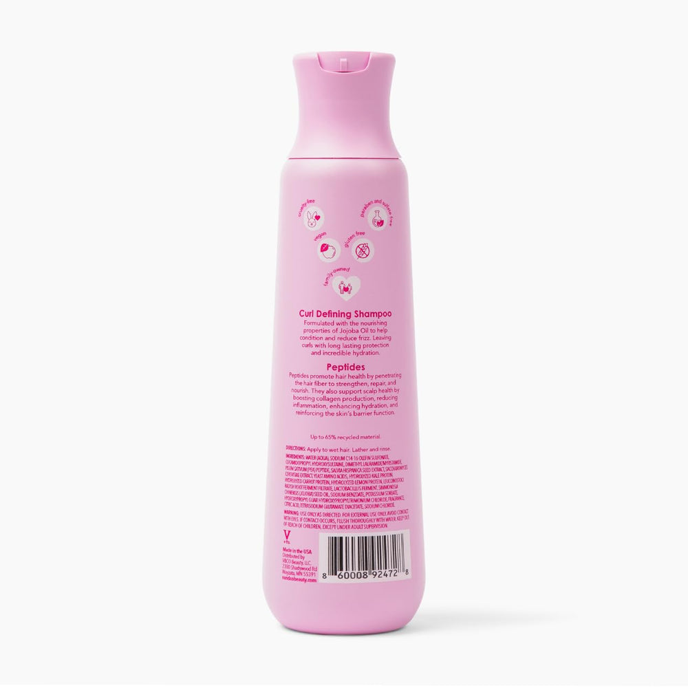V&CO Curly Pop vegan cruelty-free logo on bottle.