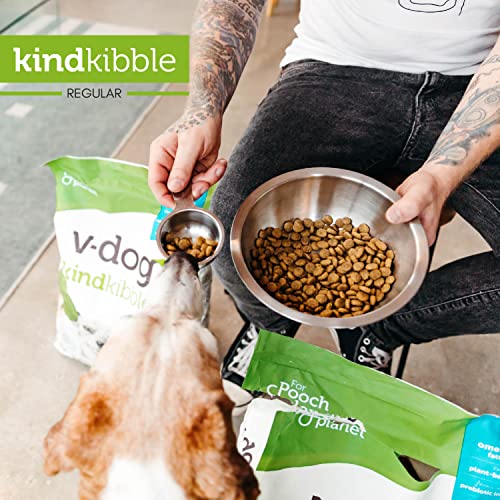 Dog enjoying V-dog Kind Kibble served in a bowl.