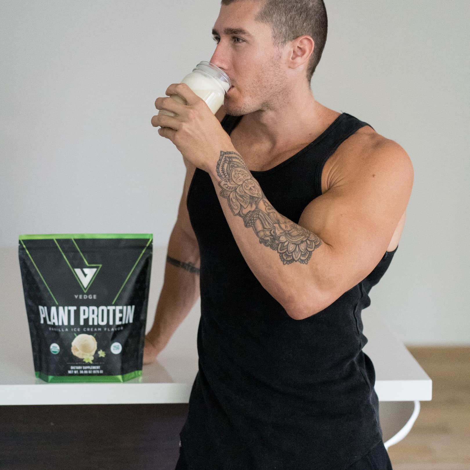 VEDGE vegan protein powder vanilla tub with glass of shake suggests daily smoothie use