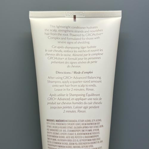 Creamy texture of VEGAMOUR GRO+ Balancing Conditioner shown in a dollop.