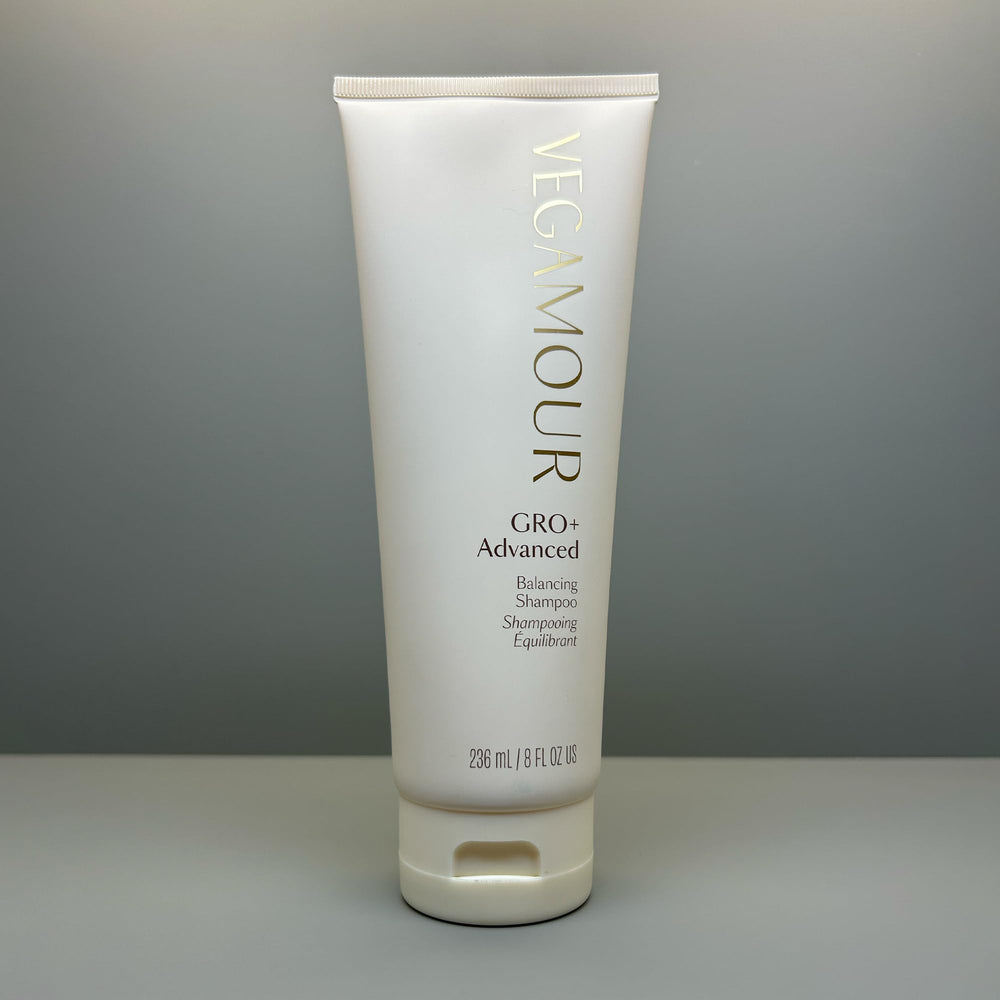 Product shot featuring rosebay leaf element hinting at soothing scalp care.