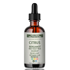 Velora red yeast rice drops bottle with citrus aroma for daily wellness support.